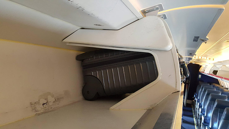 Don’t Put Your Carry-on in an Overhead Bin Where You’re Not Sitting