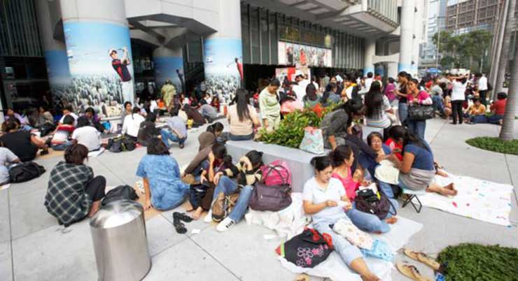 More than 300,000 domestic helpers congregate in urban areas like these