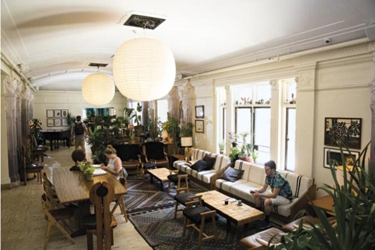 Visitors relax in the Freehand’s common area.